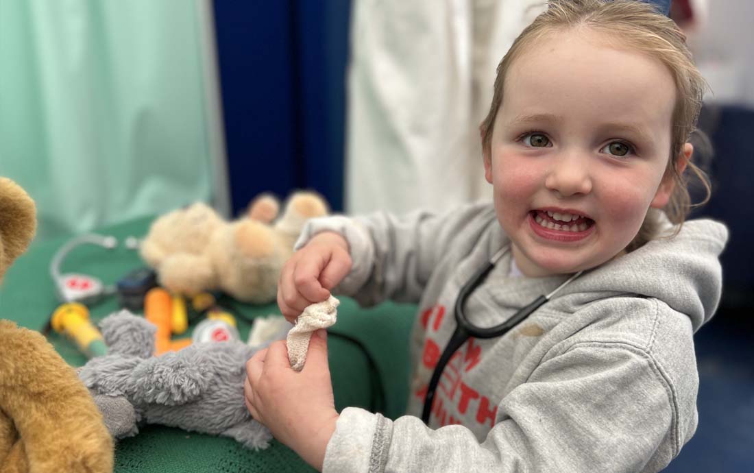 Image of girl at the Teddy Hospital stand, Gwyddonle 2024