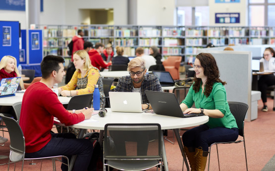 Group of students at the Bay Campus library