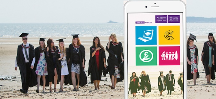 Image of the app on an iPhone with students on a beach in the background