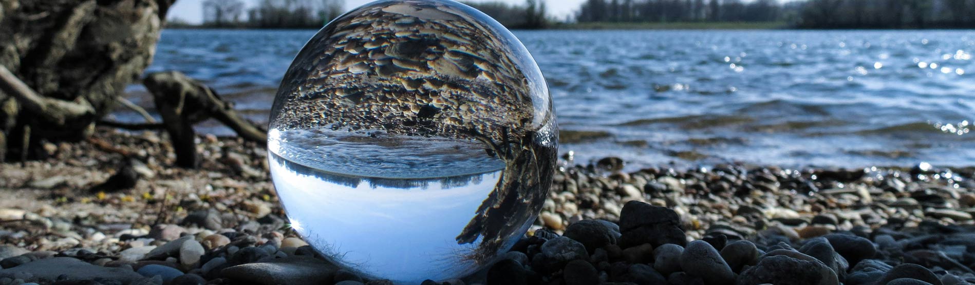 A glass ball reflecting the sea.