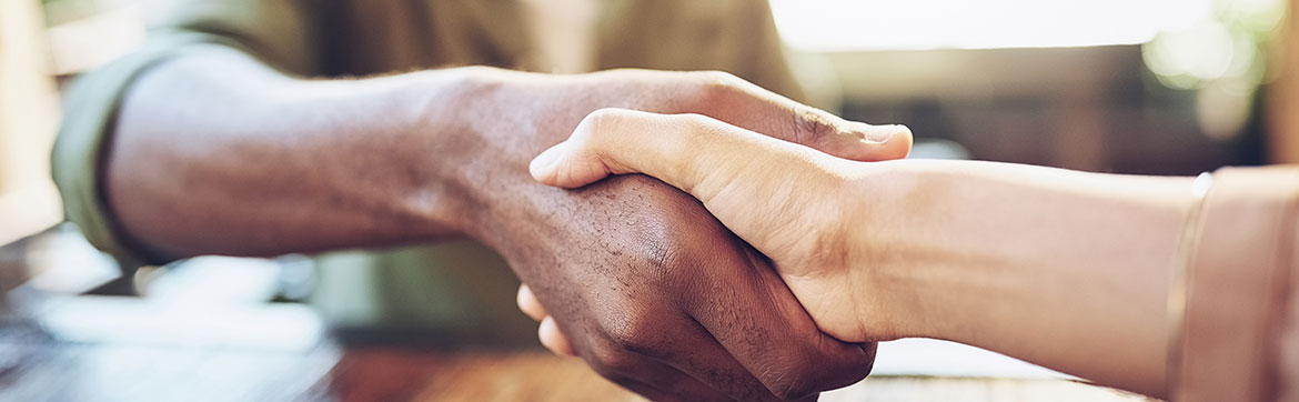 Two people shaking hands