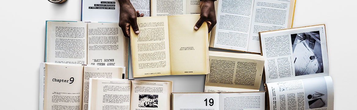 A man surrounded by books