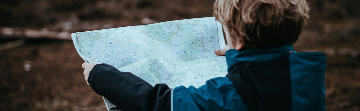 A person reading a map