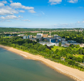 Aerial shot of Singleton Park Campus and the Beach in the glorious sunshine