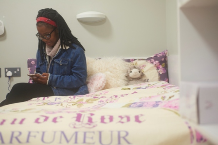 Young Lady on her bed in Bay Campus