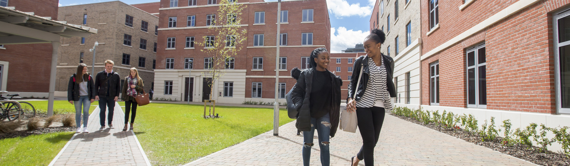 Students outside Bay Campus residences.