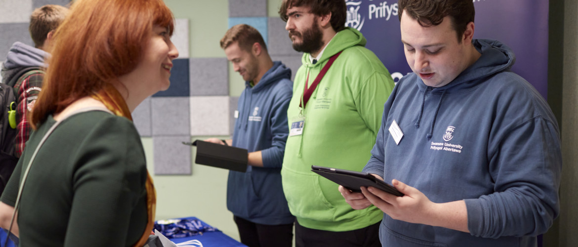 People registering at an open day