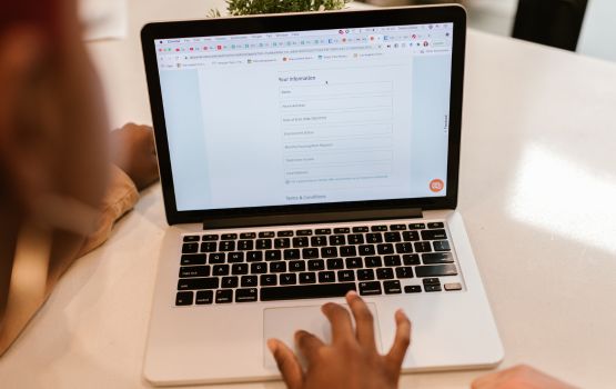 Person typing on a computer