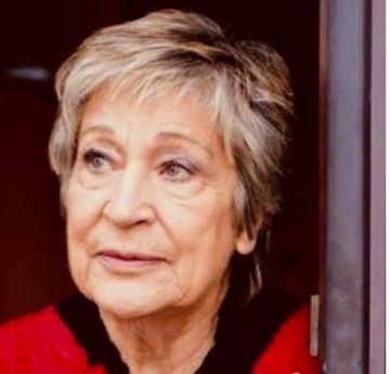 Headshot of lady looking away from the camera