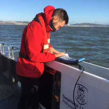 Sam Files collecting data at sea in Mary Anning research vessel