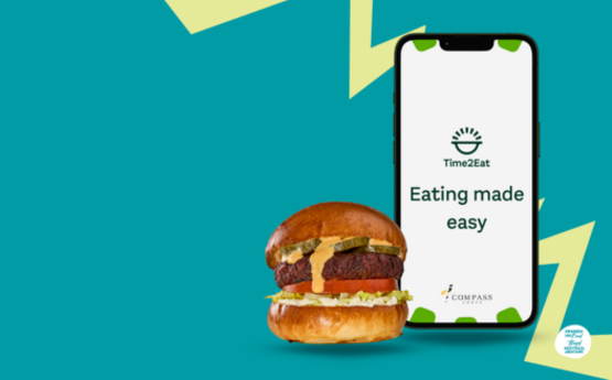 a mobile phone and a burger