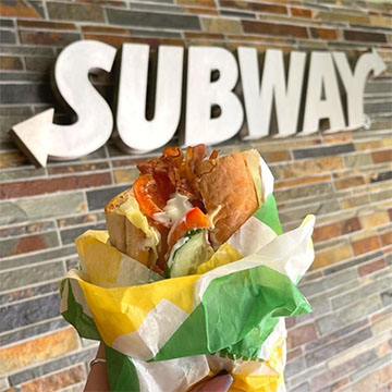 A sub roll being held up to the camera
