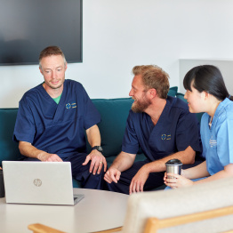 An image of medical staff discussing.