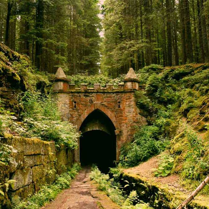 A tunnel under a bridge