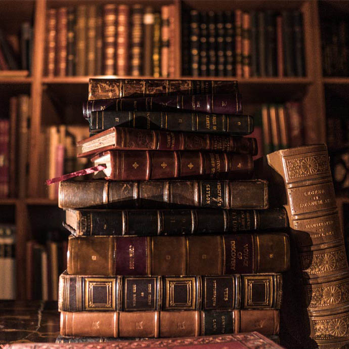 Image of books stacked on top of each other