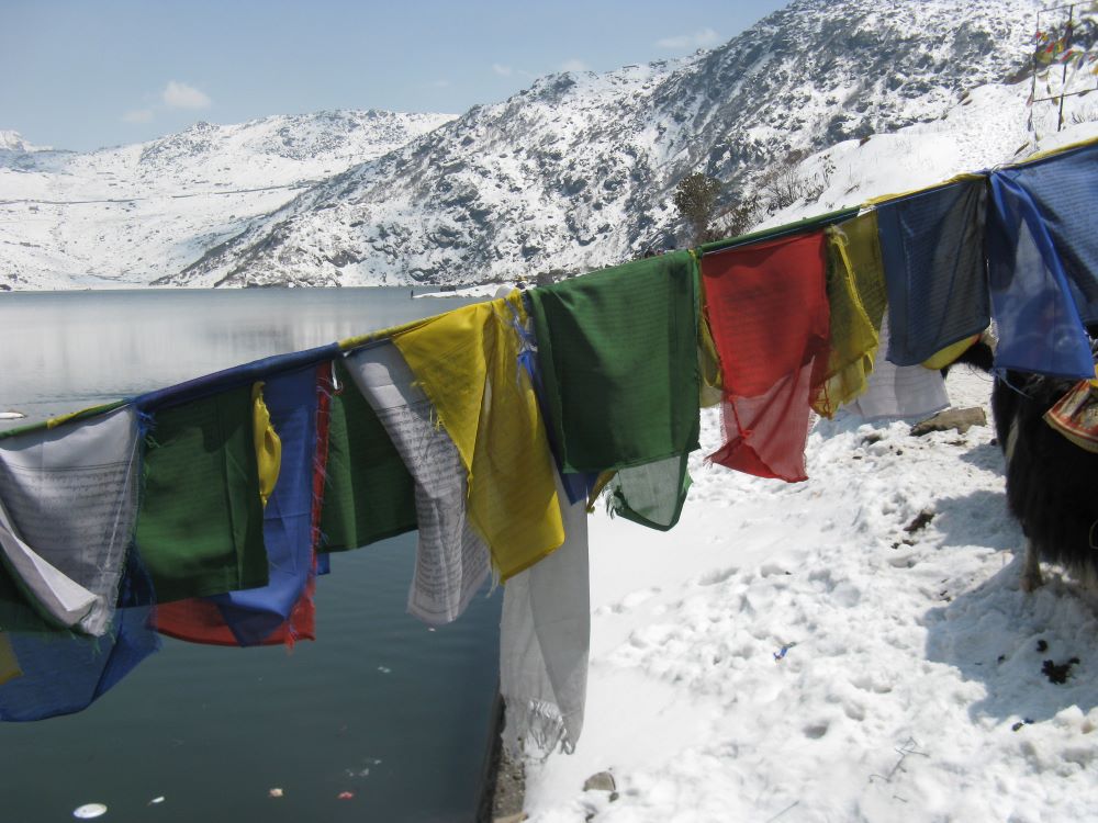 Prayer flags over lake