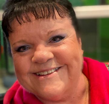 Lady smiling at the camera