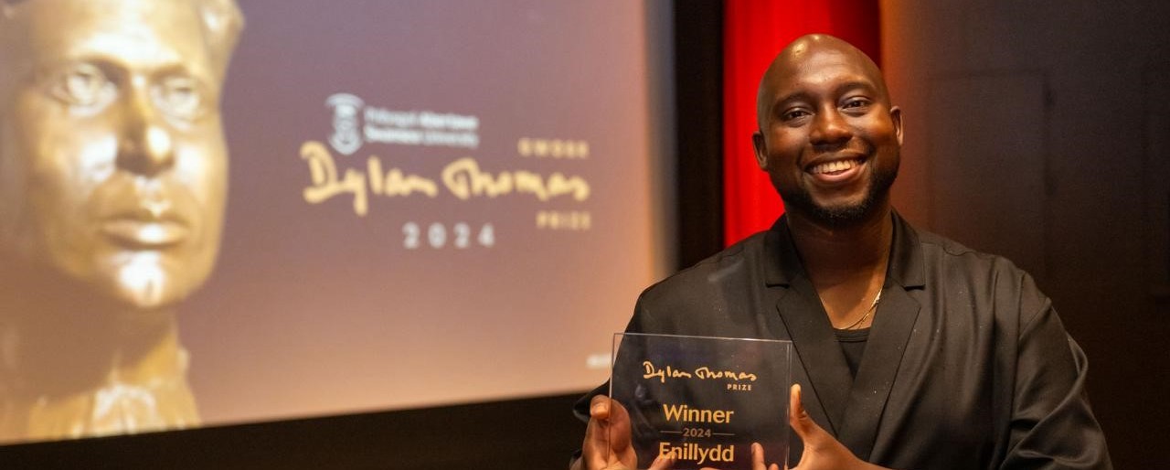 Caleb Azumah Nelson, 'Small Worlds' (Viking, Penguin Random House), holding trophy