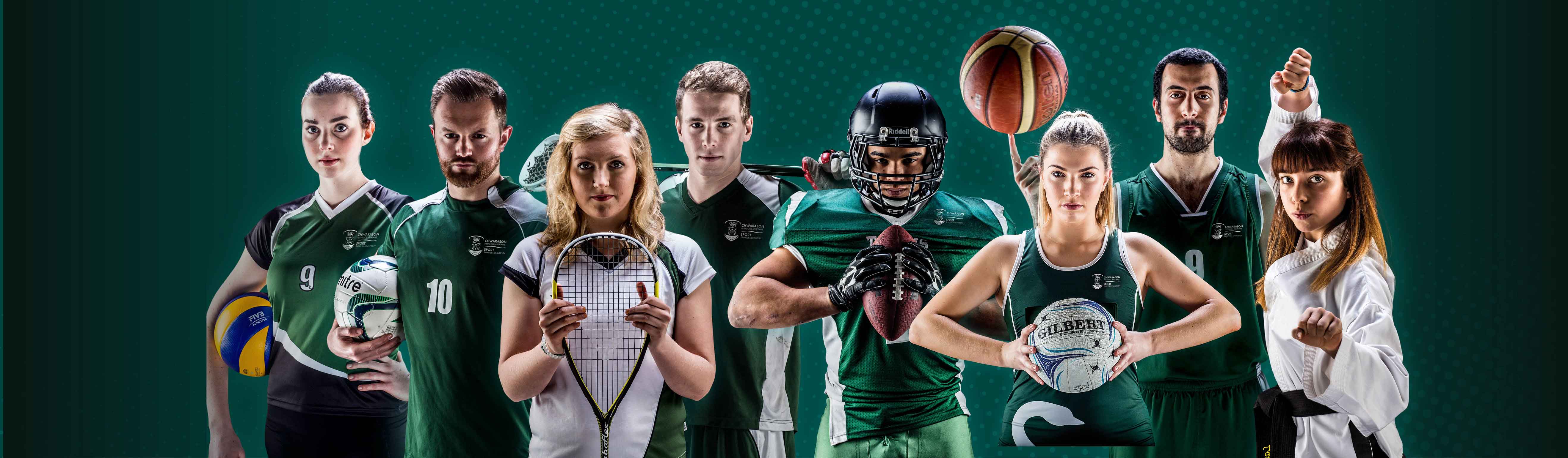 Students in their sports playing kit with the new Swansea University Sport logo 