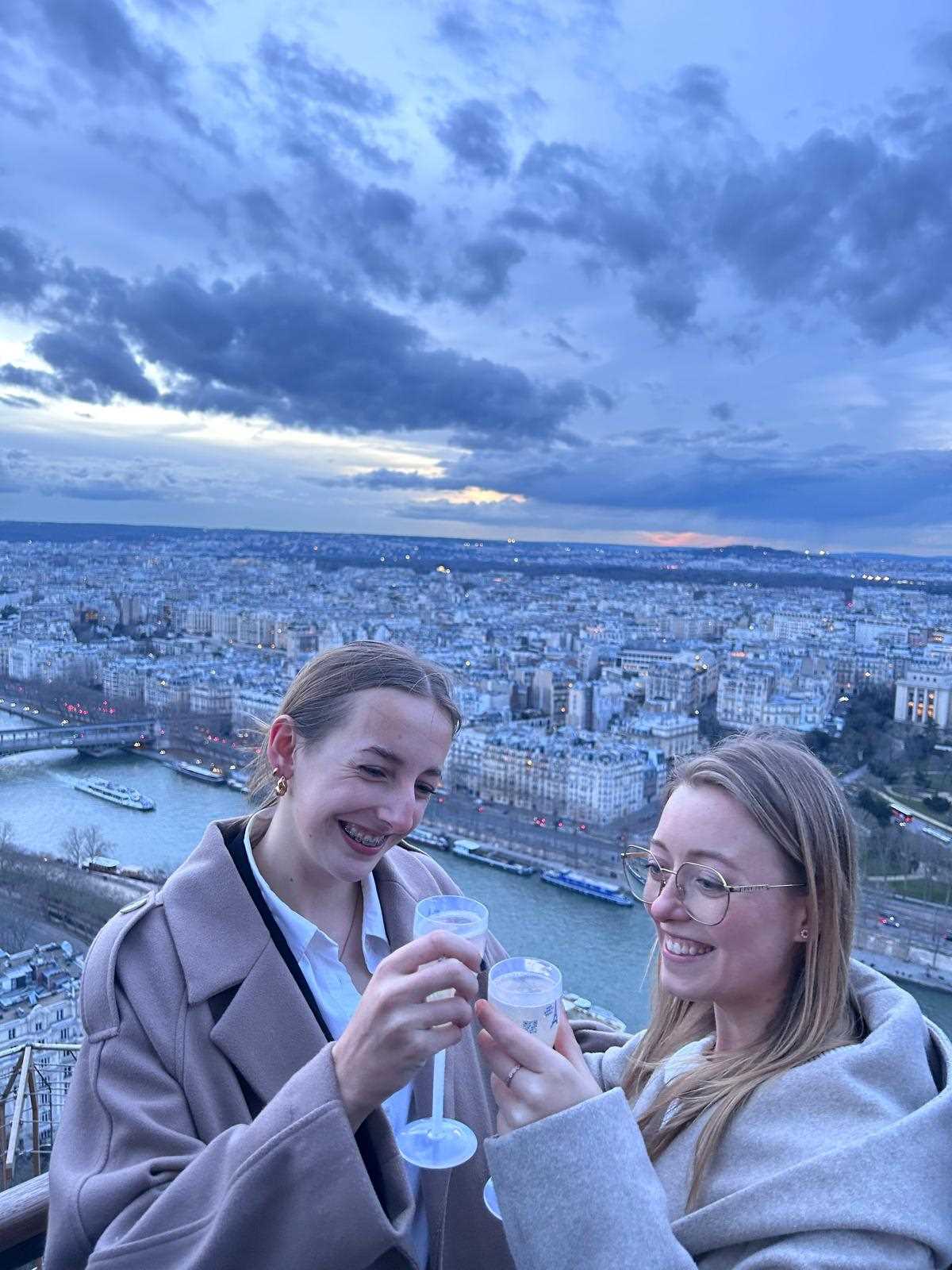 Two students celebrating in Paris