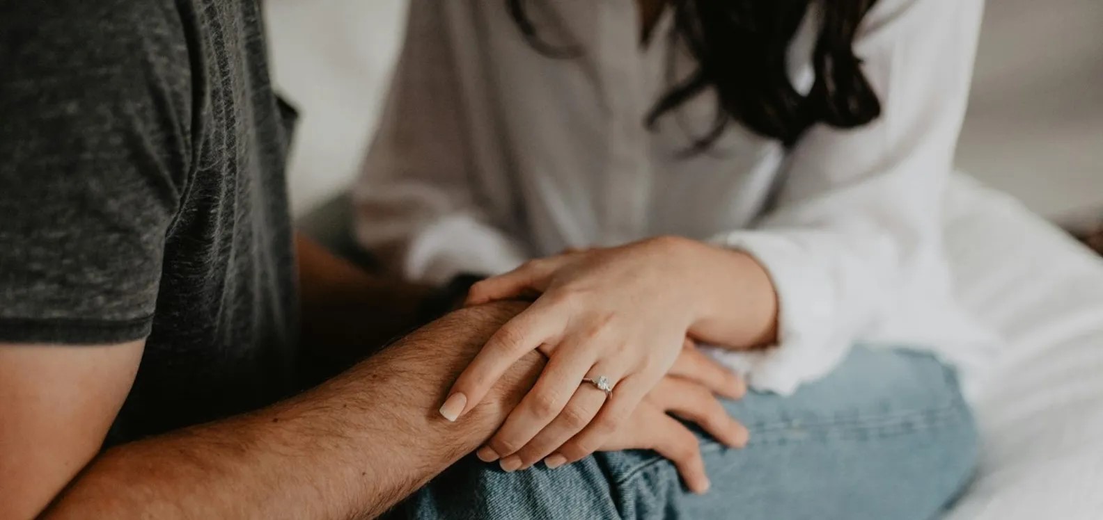 Man and woman holding hands
