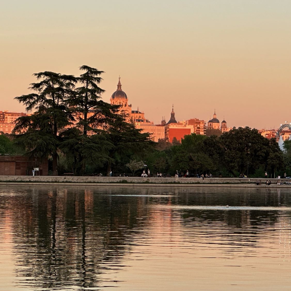 Madrid skyline reflected over lake