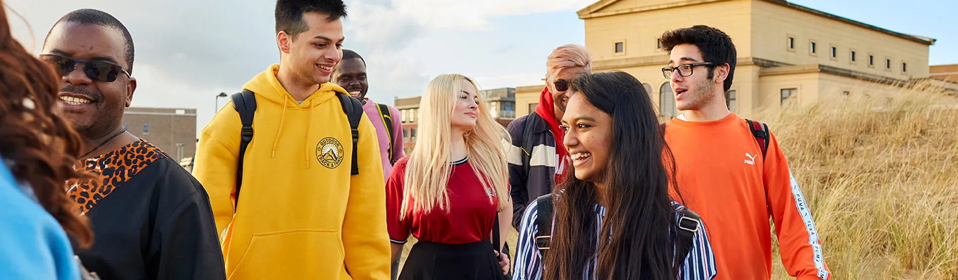 Students walking through Bay Campus