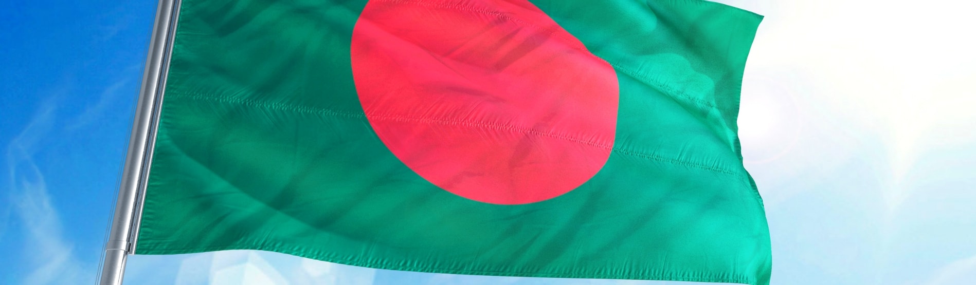 The flag of Bangladesh waving in the breeze.