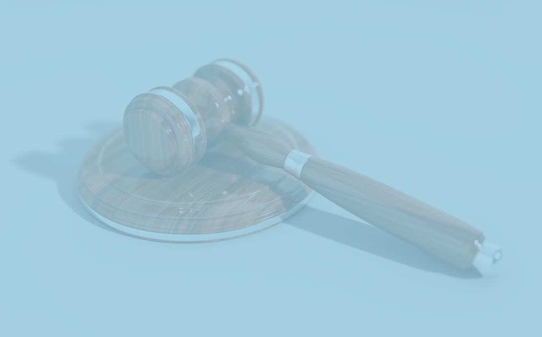 a gavel on a blue background