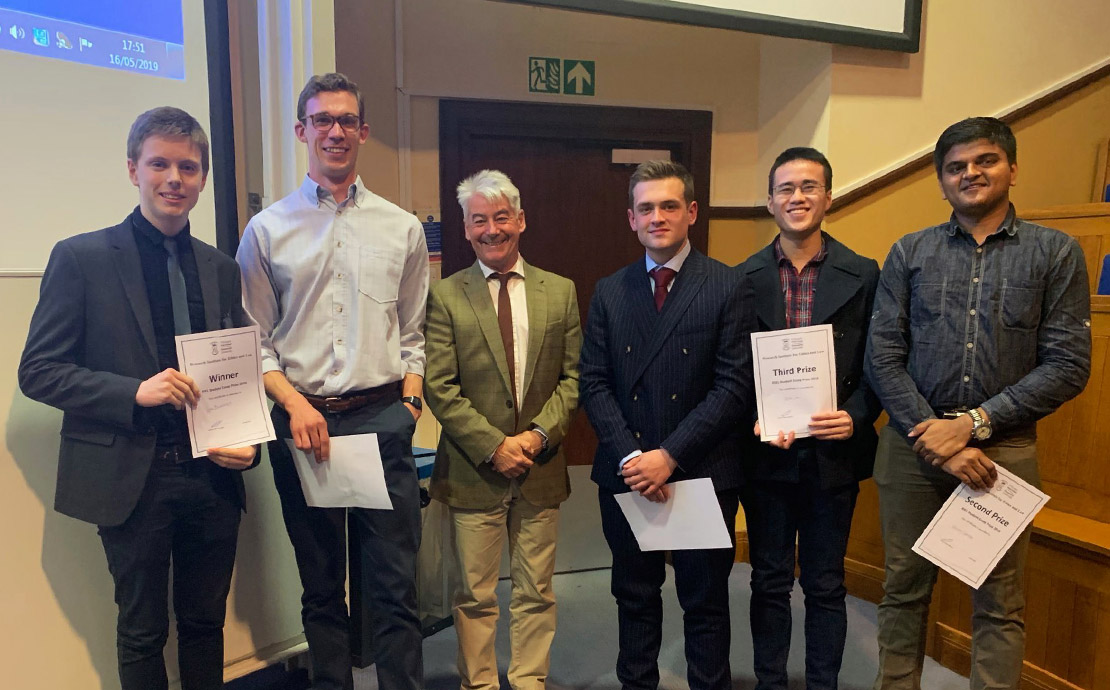 Law student Callum Reid-Hutchings and the other finalists of the RIEL Essay Prize