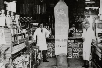 Photograph of interior of co-opertive shop with advert for chocolate club