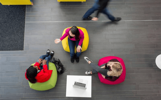 A group of people discussing.