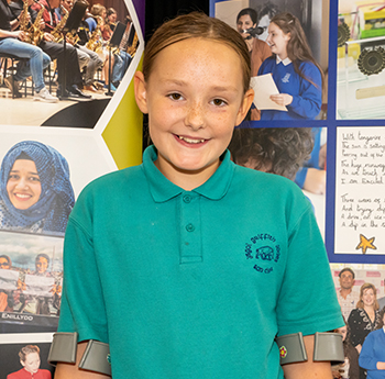 Teleri Hewens holding her goody bag prizes