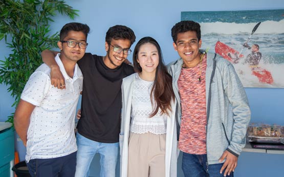 Four International students in a group