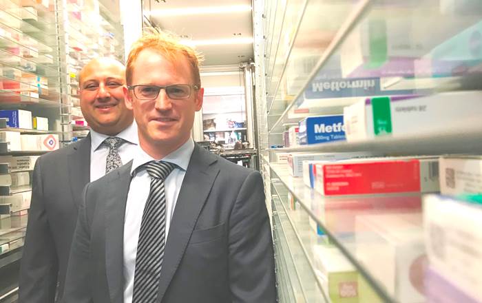 Swansea University’s Head of Pharmacy Andrew Morris pictured with Dr Mo Nazemi at Evans Pharmacy’s Ty Elli branch.