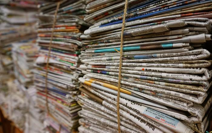 Image of stacked newspapers