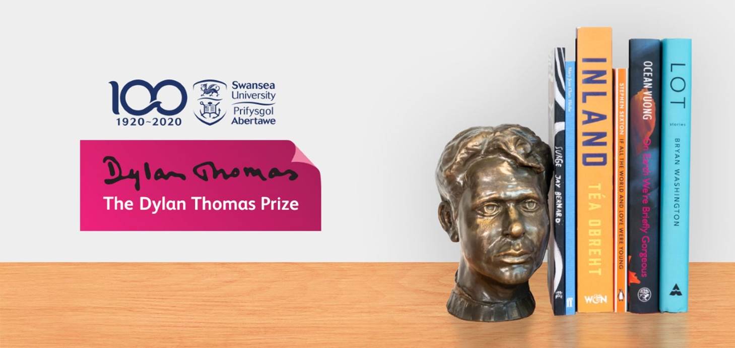 Six books on this year's shortlist next to a bust of Dylan Thomas