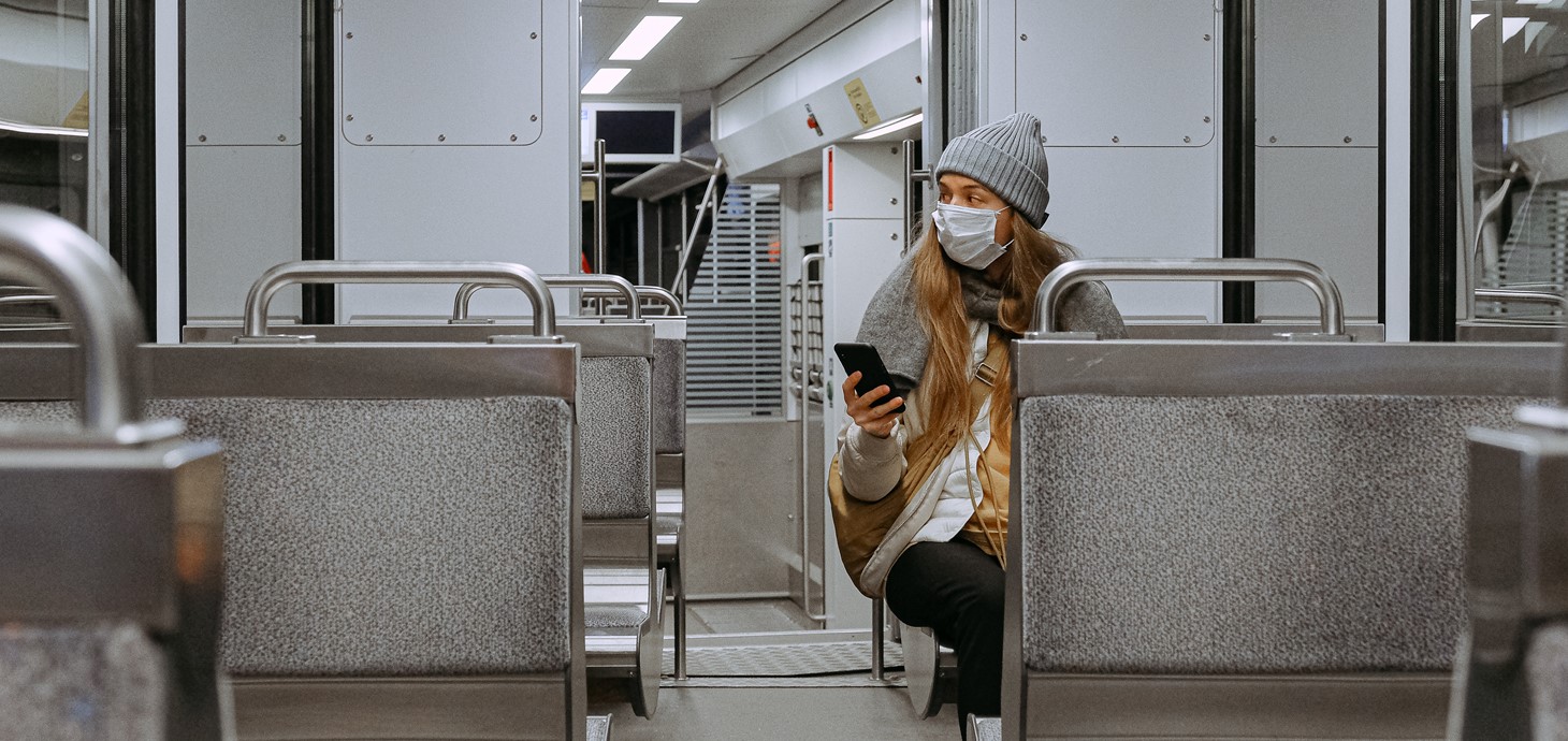 A woman sitting on her own in a train carriage during the coronavirus crisis.