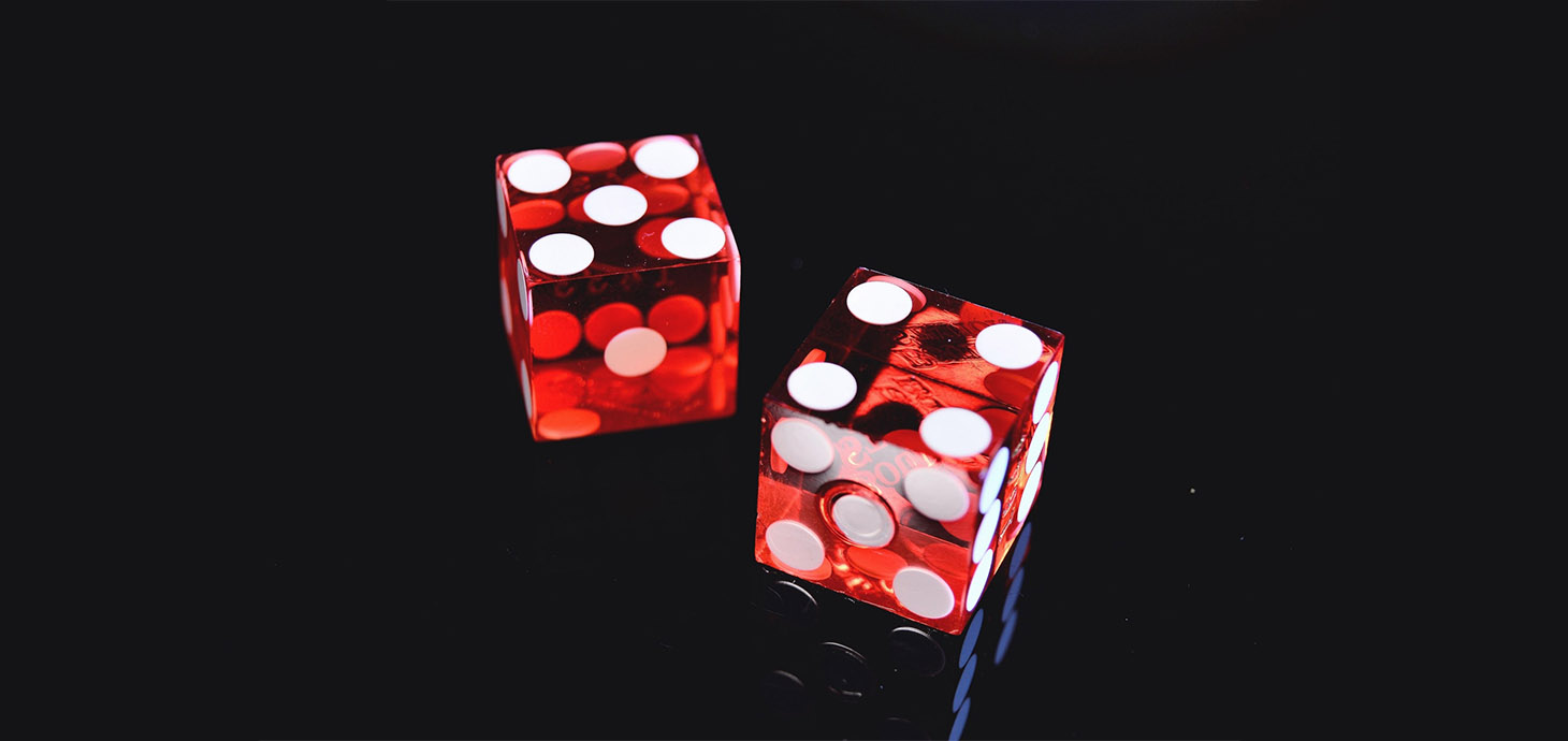 Picture shows two red dice.