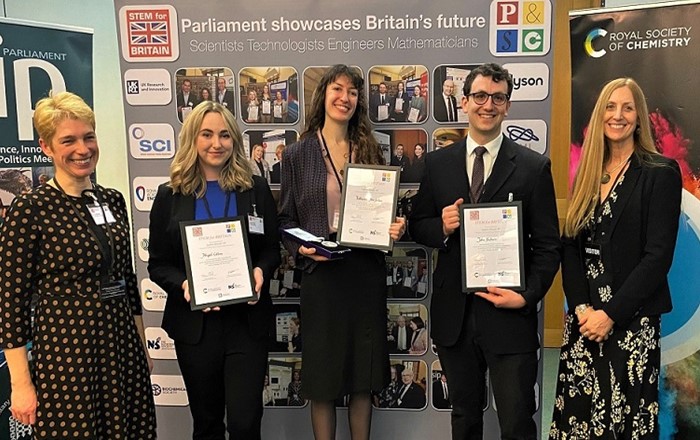 John Hudson, second from right, receives his chemistry award at the STEM for Britain event in Parliament 