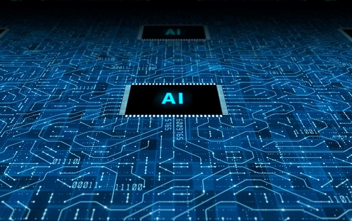 A circuit board marked with the letters AI: Swansea experts have co-authored a new report on the use of artificial intelligence (AI) in detecting terrorist activity online. 