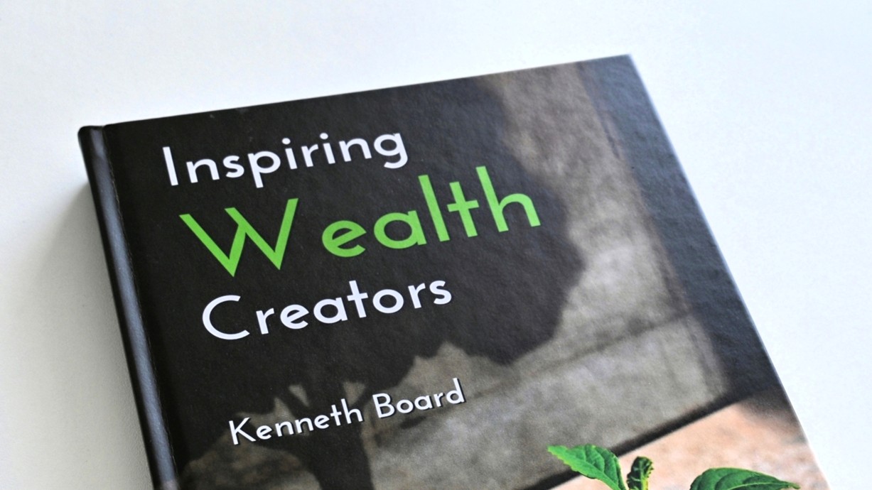 The front cover of Inspiring Wealth Creators.