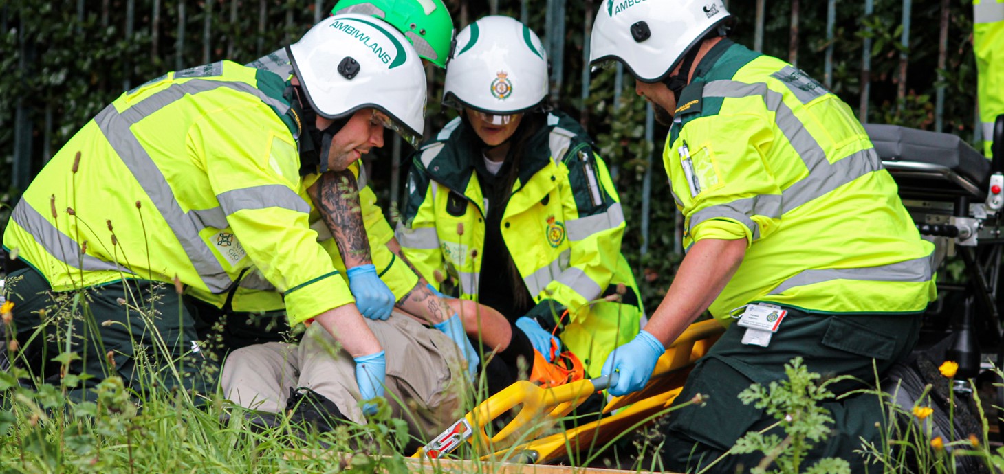 Paramedic students providing medical care to patients during the exercise.