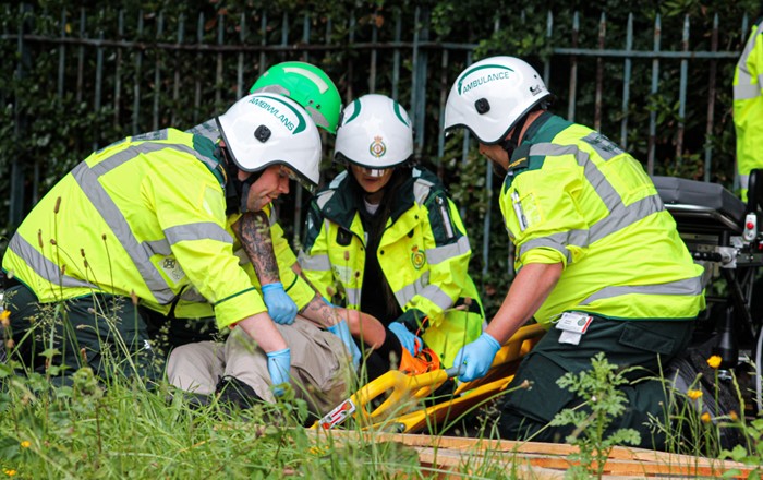 Paramedic students providing medical care to patients during the exercise.