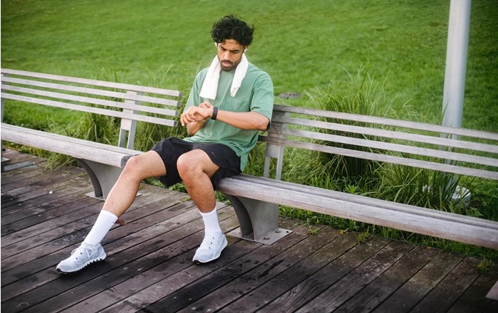 A man checking his fitness tracker after exercise: a Swansea sociologist has been honoured by the journal Current Sociology for his new research into self-optimisation, which is a term for ideas and practices aimed at continuous enhancement Credit: Ketut Subiyanto, Pexels