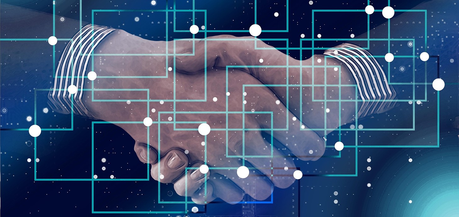 An image of handshake with an abstract image overlayed to depict a network