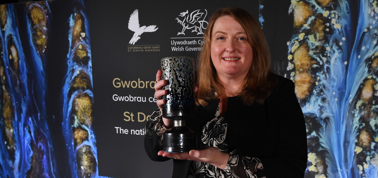 Woman holding trophy