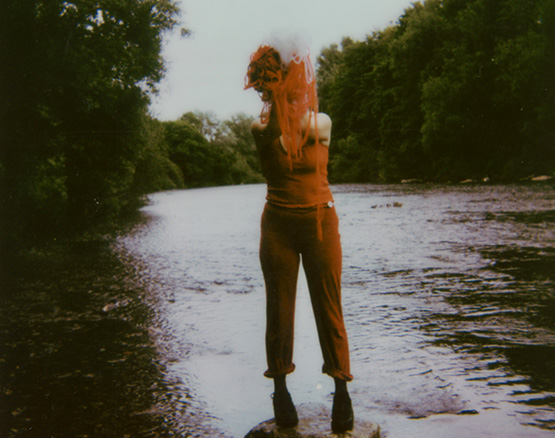 woman with wool covering her face