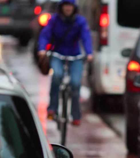 Cyclist amongst traffic