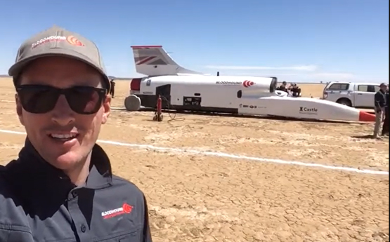 Professor Ben Evans in front of Bloodhound SSC
